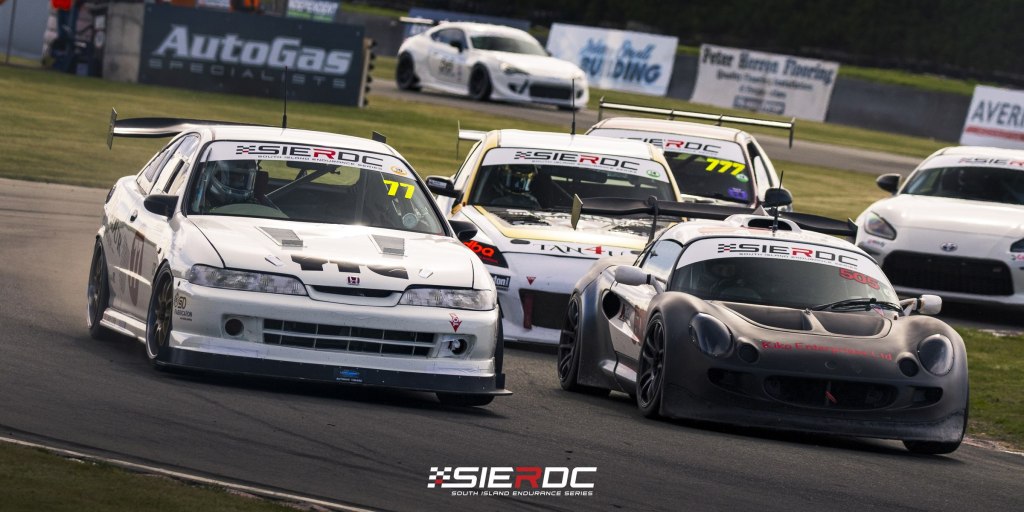 Honda Integra #77 leading a Class 1 to 3 pack at Levels Raceway