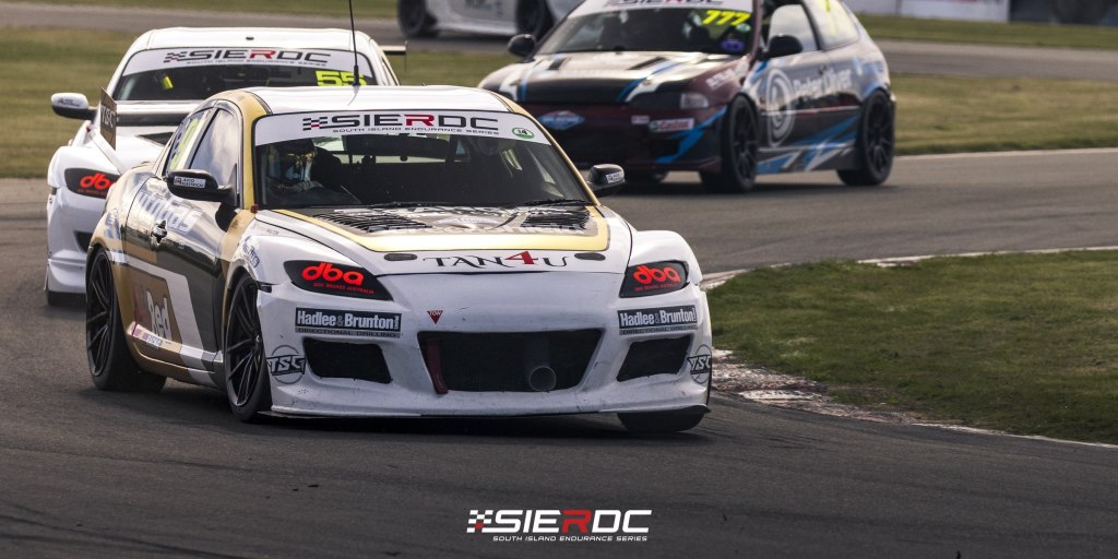 Tan4U Mazda RX-8 leading the Peter Diver Honda Civic #777 at Levels Raceway