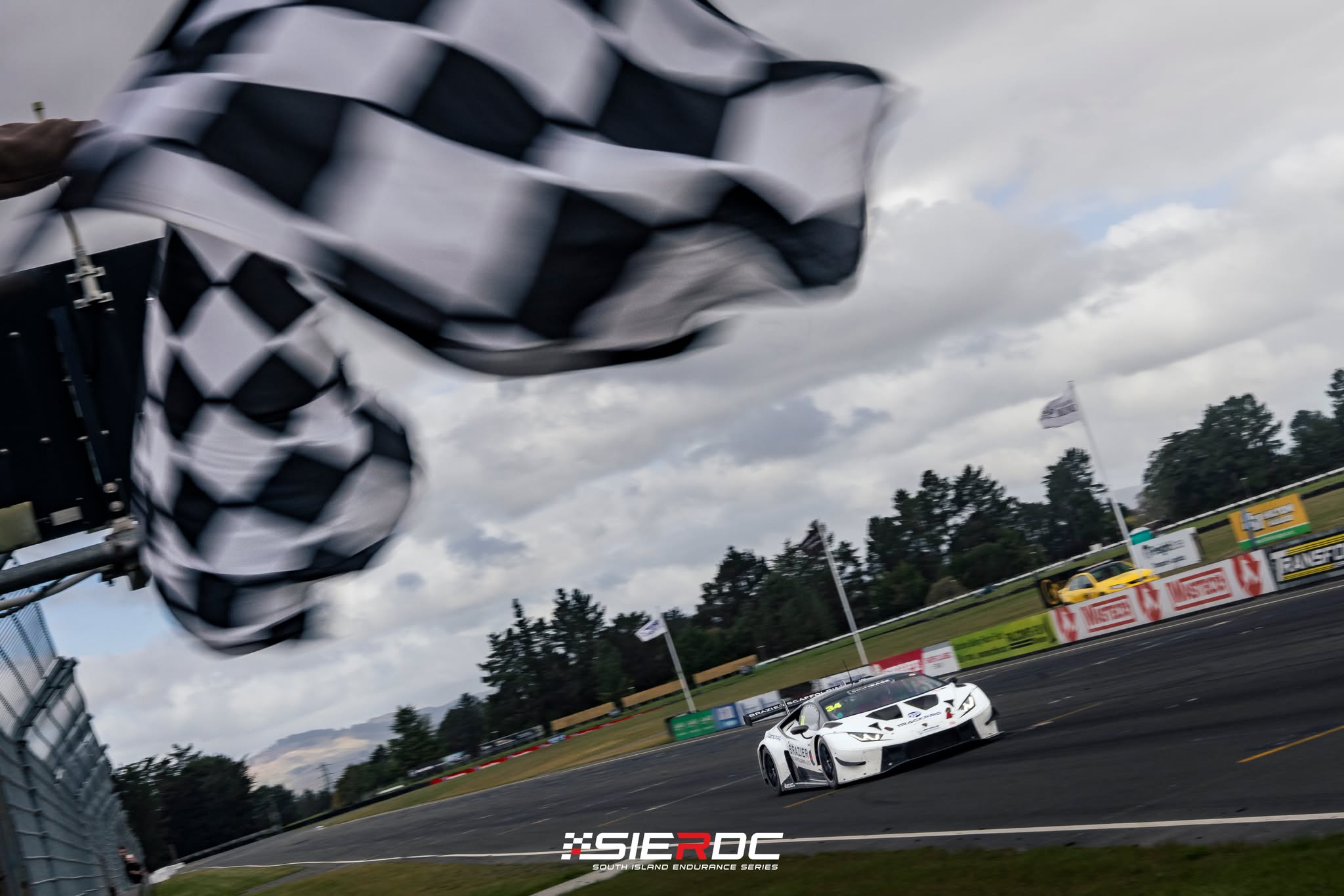 Glen Brazier and Andrew Waite take the chequered flag in their Lamborghini Huracán at Ruapuna